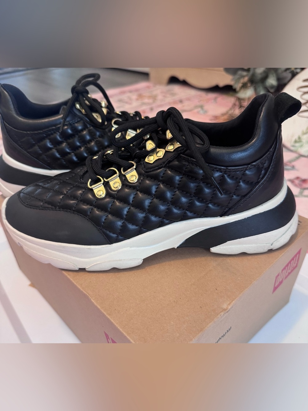 ShuShop Black Quilted Sneakers with Gold Eyelet Details and White Platform Sole